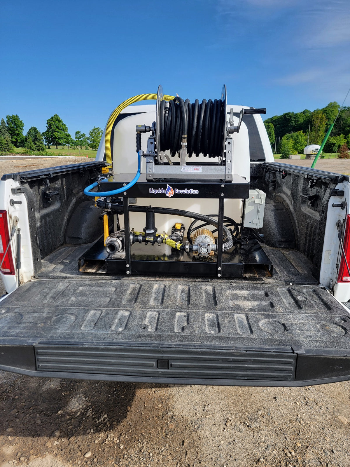 Liquids Revolution 200 gallon sidewalk sprayer rear truck-bed view